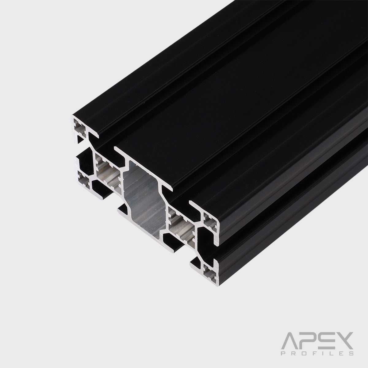 Black metal profiles stacked on a light gray background with 'Apex Profiles' branding.